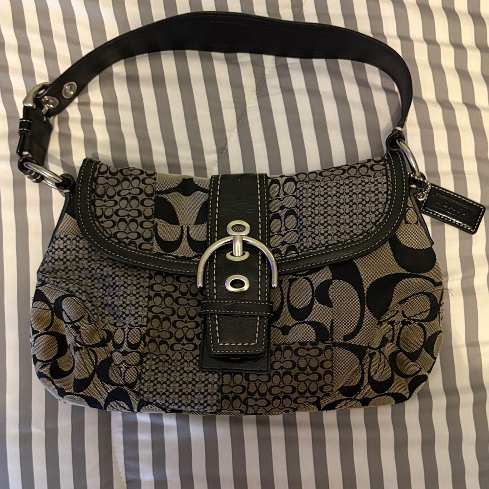 Coach Vintage shoulder bag in signature brown with coach label.